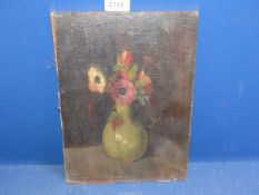 A small unframed Oil on board tilted verso 'Anemones' (vase of flowers),