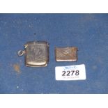 A Silver Vesta case, Chester hallmark and a Silver stamp holder (marks,