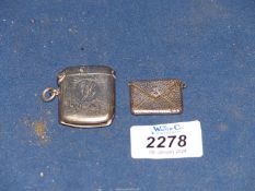 A Silver Vesta case, Chester hallmark and a Silver stamp holder (marks,