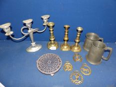 Three brass candlesticks, plated three branch candelabra, pewter tankards, horse brasses, etc.