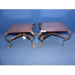 A rare pair of late 19th century heavy copper Arts & Crafts kettle trivets standing on scroll shape