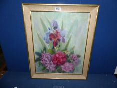 A framed Oil on board of flowers