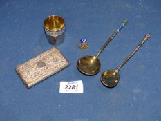 Two Russian silver spoons (one marked 84) with enamelled backs and handles,