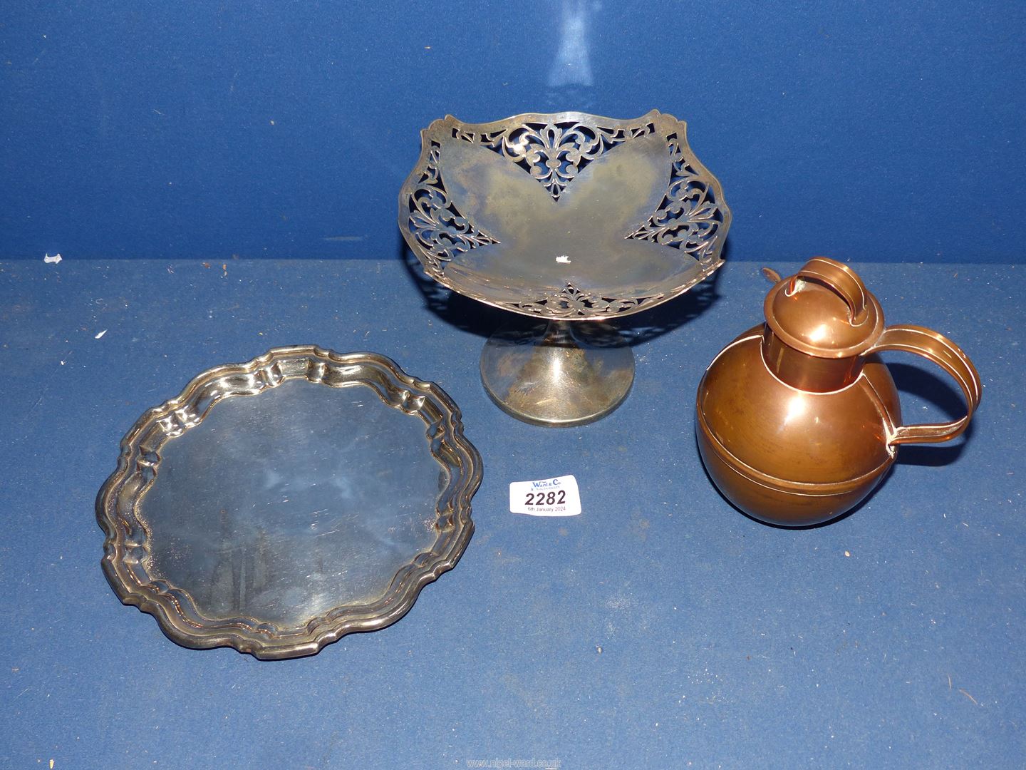 A plated Tazza and card tray and a copper tea caddy.