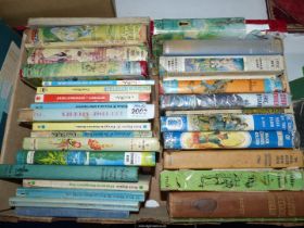 A quantity of hardback books to include Robinson Crusoe, Ivanhoe, The Famous Five books,