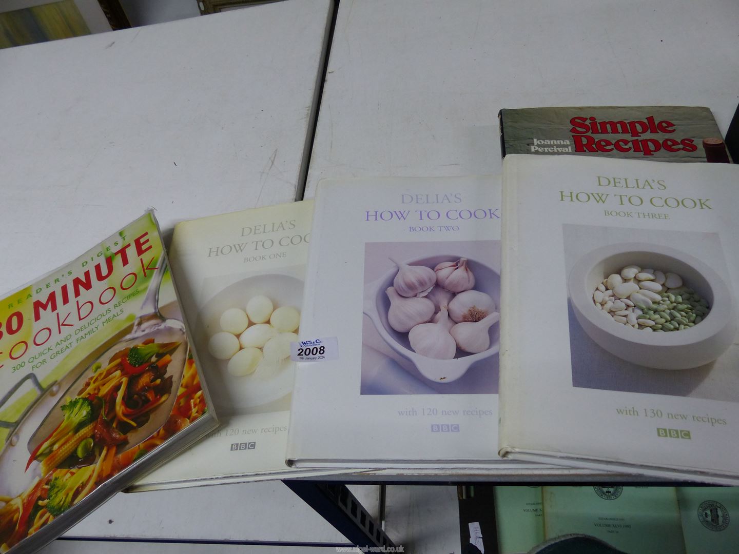 Five cookery books to include Delia Smith and The Reader's Digest 30 Minute Cookbook.