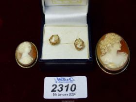 A pair of 9ct gold mounted and backed Cameo studs and two continental silver (800) mounted cameos