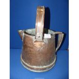 A Copper Vessel with swing handle.