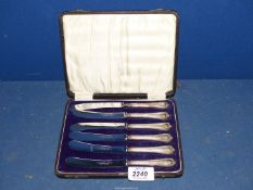 A cased set of silver handled butter knives, Sheffield.