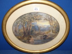 An oval framed and mounted Watercolour of a river landscape with tree lined banks and rocky