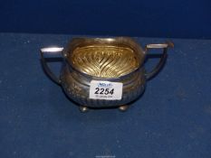 A Silver sugar Bowl having half ribbed pattern, Sheffield, 195.3 grams.