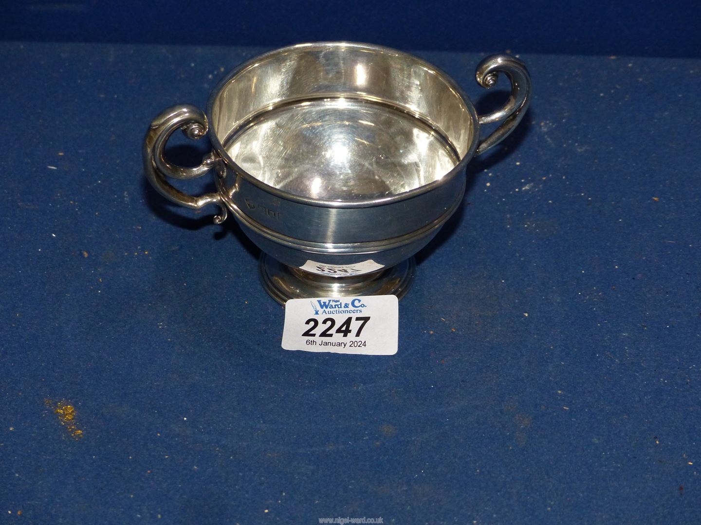 A Silver twin handle Cup/bowl, London 1905, maker James Ramsay, 105.3 grams.