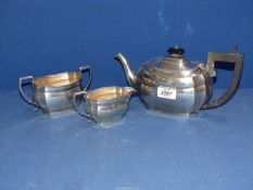 A Silver three piece Teaset, comprising teapot having bakelite handle, Birmingham 1947, J.G. Ltd.