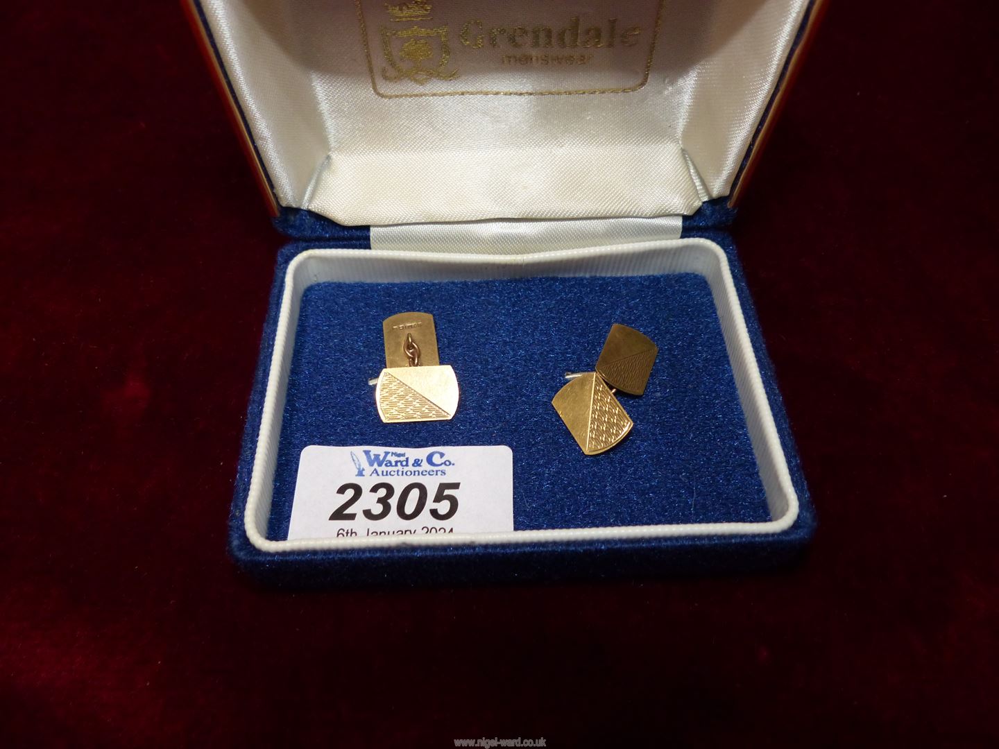 A pair of 9ct gold cufflinks, Birmingham, having engine turned detail.