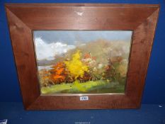 A wooden framed Oil on canvas of a country landscape, signed lower right J.