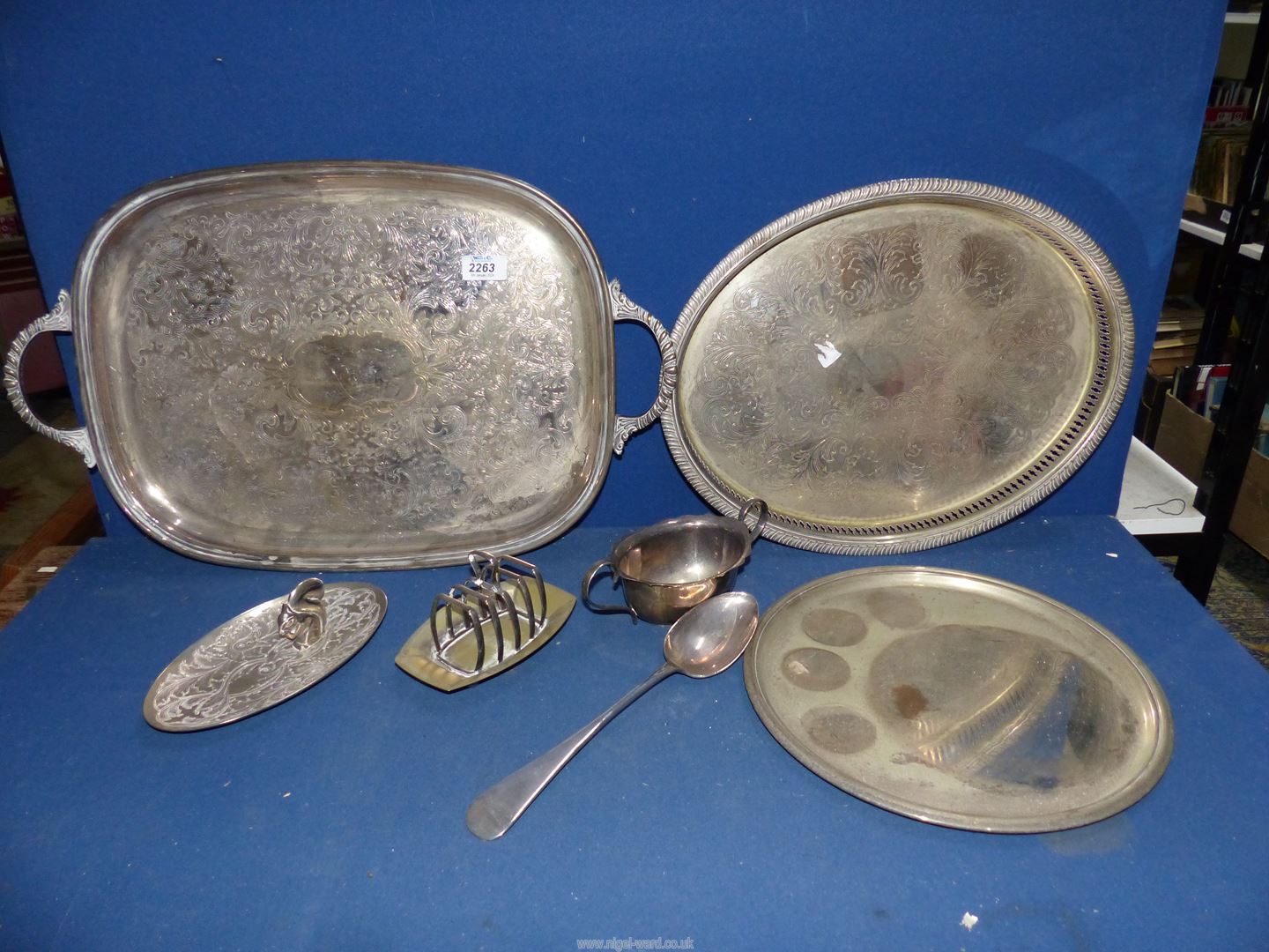 A large serving Spoon by Walker & Hall, 11 1/2", together with a white metal squirrel nuts tray,