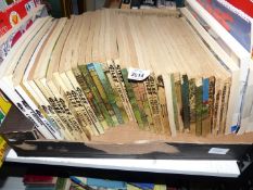 A large quantity of Giles Cartoon books, some with calendars.