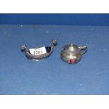 A 925 Norwegian silver salt in the form of a Viking warship and a plated souvenir salt cellar from