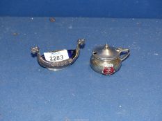 A 925 Norwegian silver salt in the form of a Viking warship and a plated souvenir salt cellar from