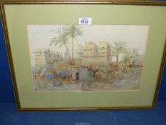 A framed and mounted Arabic Watercolour with figures and a cow outside buildings,