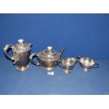 A Teaset having Celtic design to rim including teapot, hot water pot, sugar and creamer.