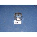 An octagonal shaped Silver Serviette Ring, maker LS, 27.7 grams.