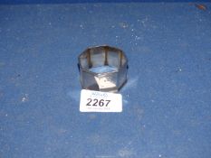 An octagonal shaped Silver Serviette Ring, maker LS, 27.7 grams.