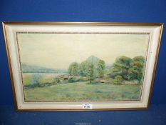 A framed Oil on board of a country landscape with a stone bridge spanning a river,