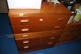 A Teak Chest of five long drawers - 33½" wide x 19" depth x 39½" high.