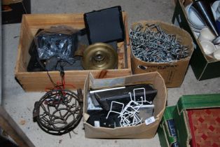 A 'Chateau' wine box, speakers, and bird-wire basket.