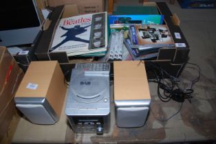 A 'Goodman's' CD/Radio player, and speakers, plus DVD's and Books, etc.