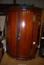 A Mahogany crossbanded, cylinder front corner Wall Cupboard with two shelves - 27" wide x 37" high.