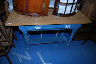 A Shabby-chic painted based side table having a frieze drawer - 53" x 19½" x 29½" high.