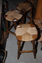 Three bar stools.