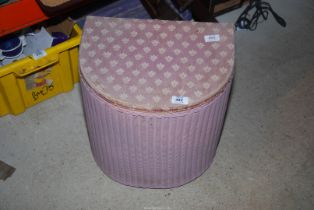 A 'Lloyd Loom' Lusty laundry box.