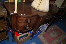 A most substantial breakfront Mahogany Sideboard having a central frieze drawer and a deep drawer