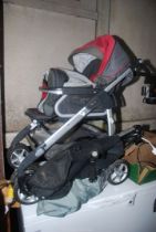 A 'Silver Cross' pushchair, and a fold-up 'buggy'.