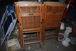 Four 'Teak' Garden folding Chairs.