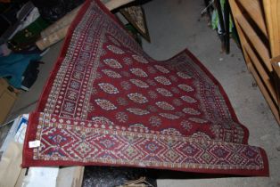 A red 'Bokhara' design rug - 120 x 170 cm.