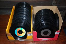 Two boxes of 45 rpm records including Hot Chocolate and some out of Juke boxes.