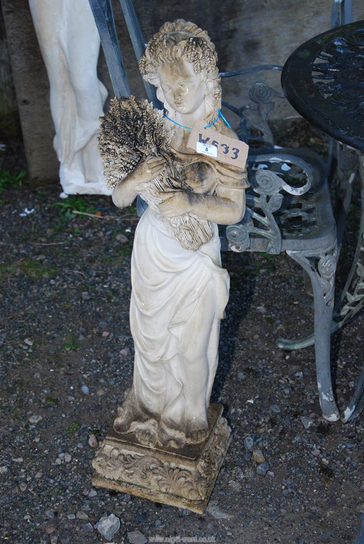 A figure of a Maiden holding a sheath of corn - 3' high.