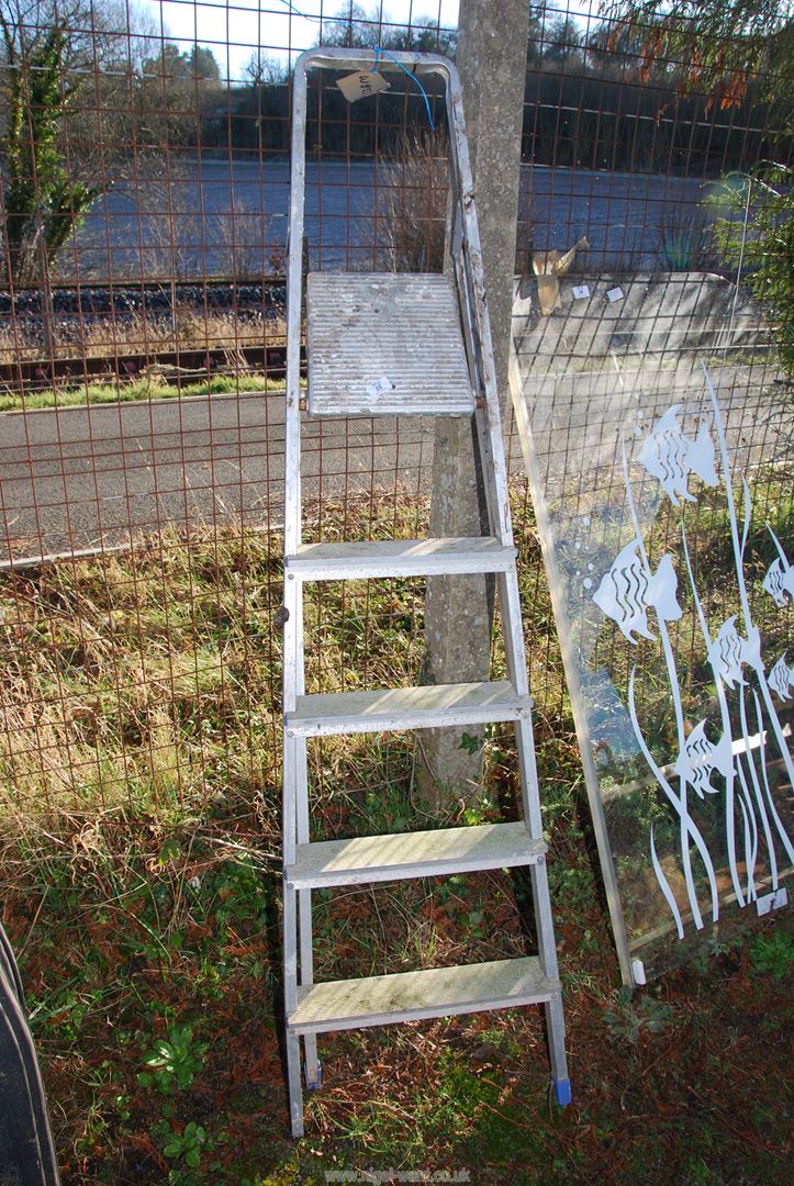 A Five-rung Aluminum Step-ladder.