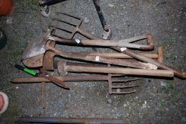 A quantity of Garden tools, including - Spades, Forks, and Pickaxe etc.
