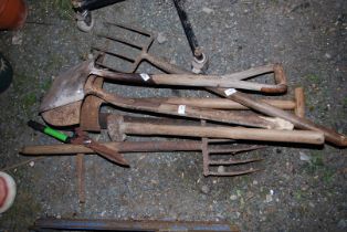 A quantity of Garden tools, including - Spades, Forks, and Pickaxe etc.