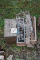 A Military Ammo-box, three small Chicken Feeders and a Rat Cage/Catcher.