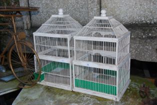Two Bird cages.