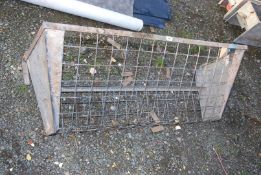 A galvanized gate/wall hanging Hayrack - 4' wide.