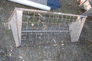 A galvanized gate/wall hanging Hayrack - 4' wide.