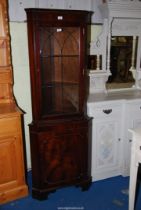 A glazed corner Cabinet/cupboard (with key) - 71" high x 26" wide.