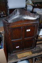 A small wooden corner cupboard - 2' high x 15½" wide.